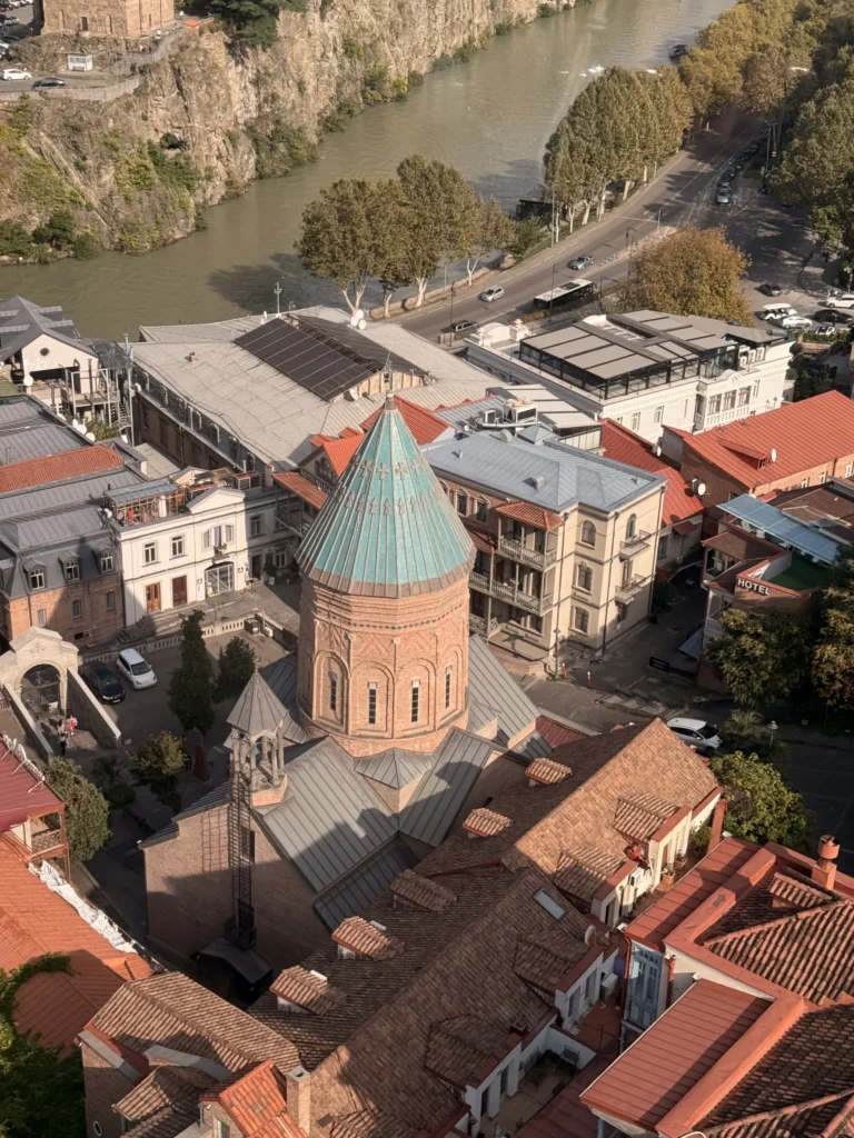 Old Tbilisi: rooftops and streets above the Mtkvari River.