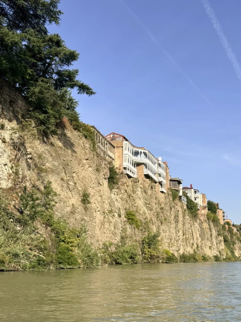 Historic Tbilisi houses perched above the Mtkvari River.