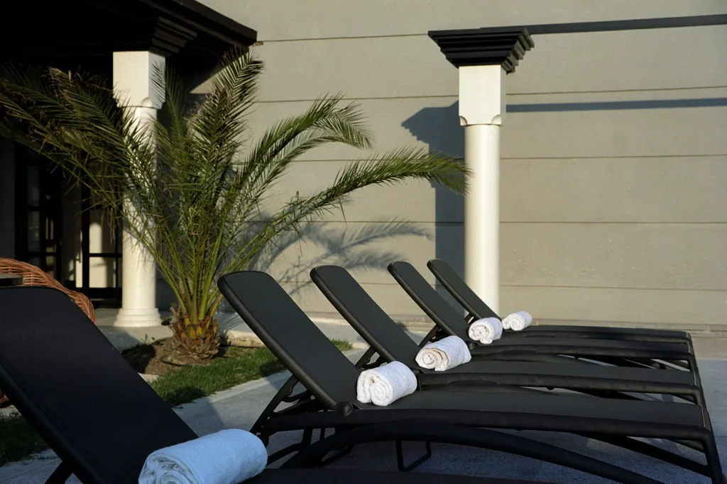 Esquisse Design Hotel — Poolside relaxation