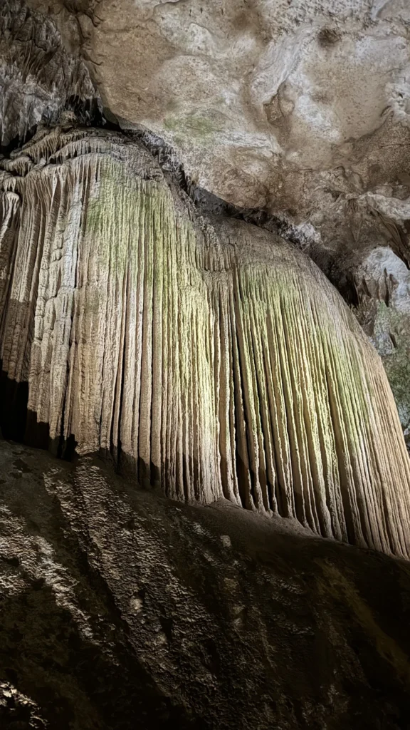Prometheus Cave: illuminated limestone formations.