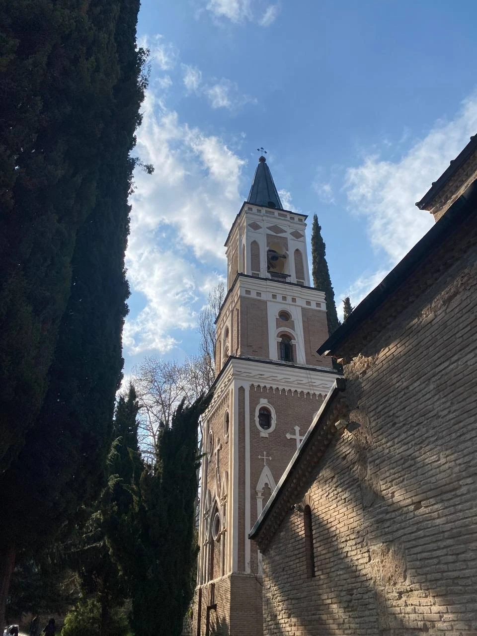Church tower and stone walls in Sighnaghi