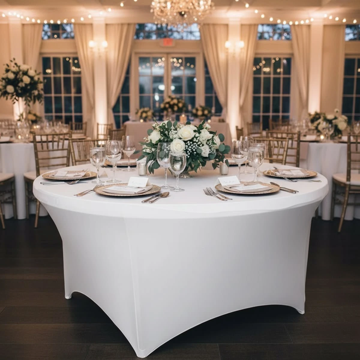 Flowers and place settings at a reception